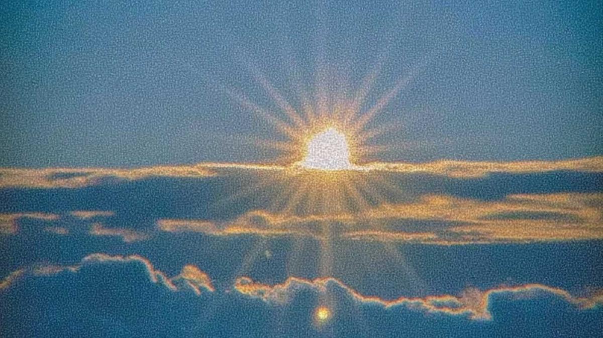 A clear sunrise representing the start of a focused monthly goal